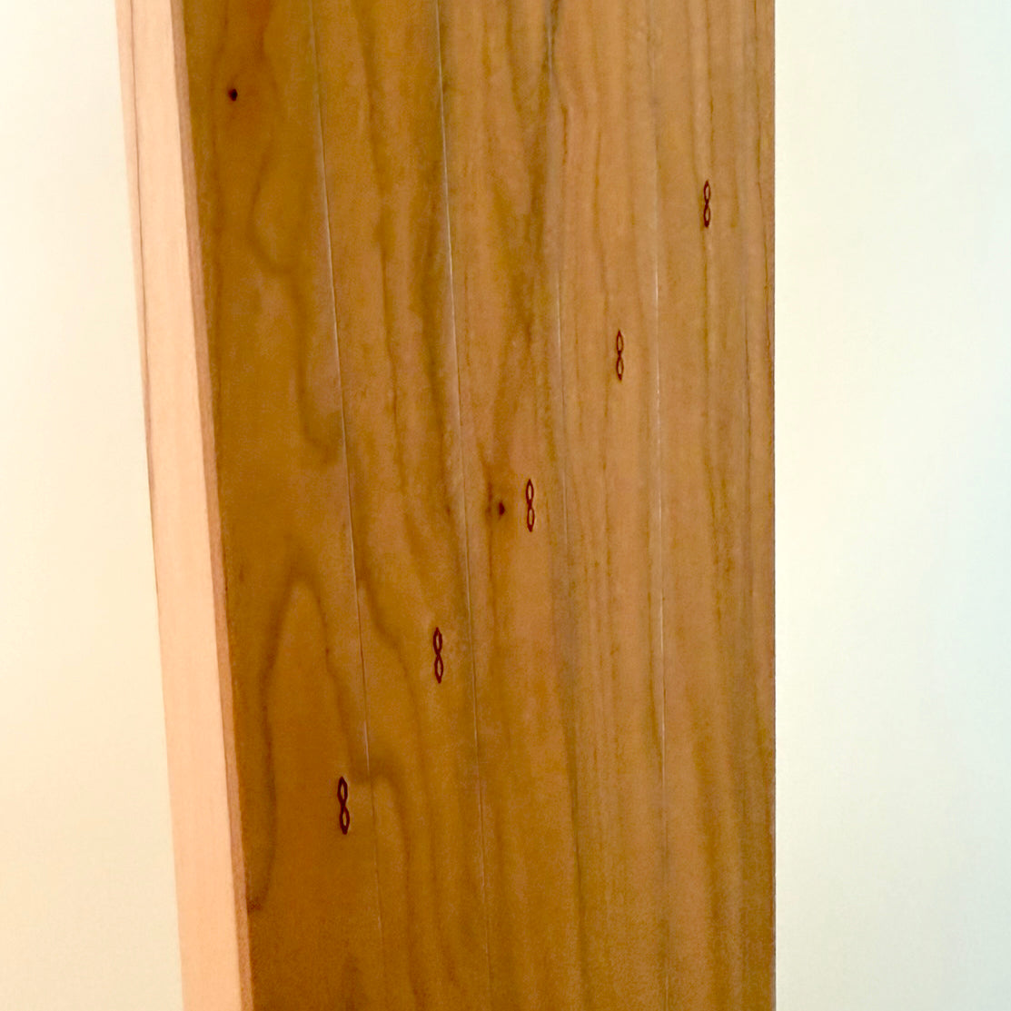 Close-up view of the centerstring marks.