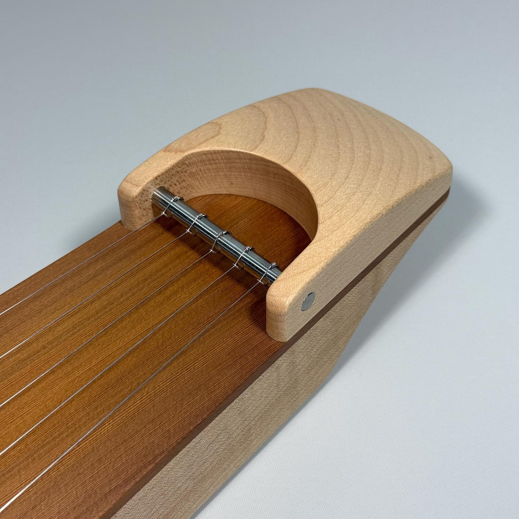 Close-up view of the kantele base.