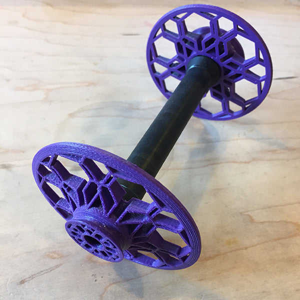 Flat-Pack Bobbin with Lacy whorls in Purple